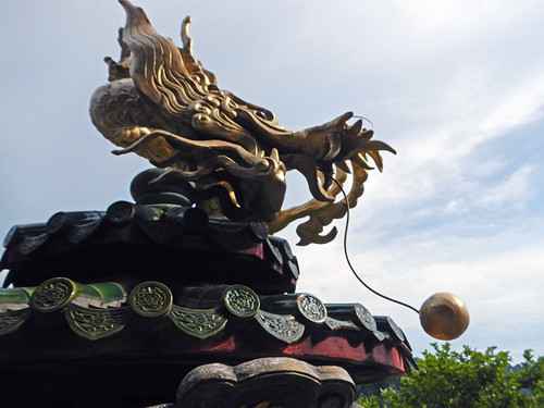 Statue of a Dragon protecting a goddess in Pankor, Malaysia