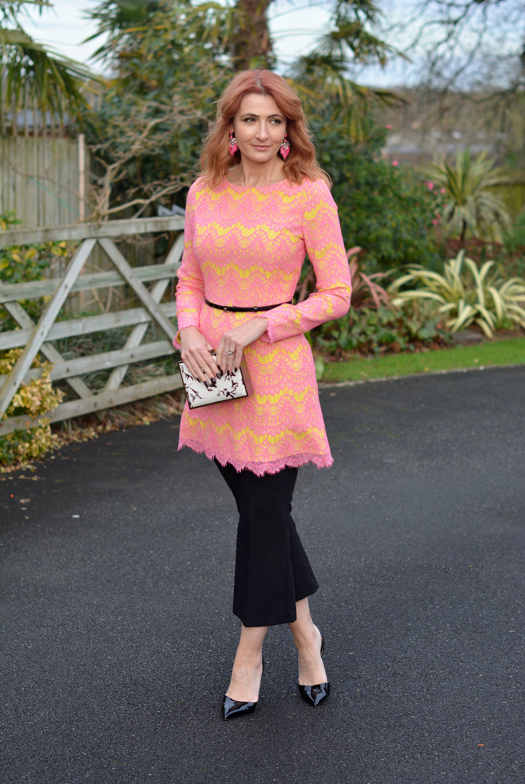 Not Dressed As Lamb | Pink and yellow lace French Connection dress layered over black cropped trousers
