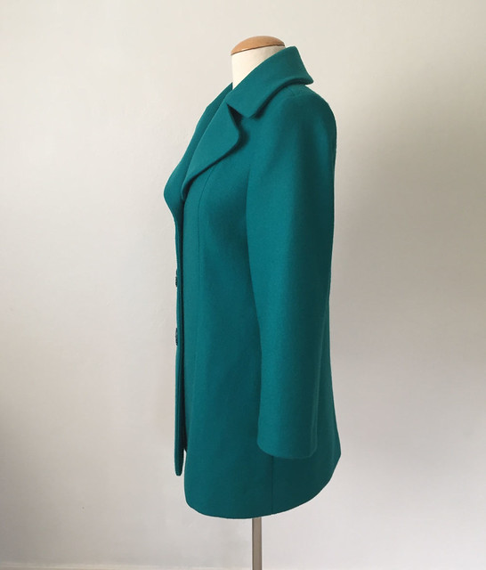 green coat on form side viewedit
