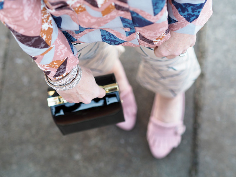 Glam casual party outfit: Mixed patterns pyjama style shirt graphic print cropped flares Gucci-inspired pink suede block heels mini black box bag | Not Dressed As Lamb, over 40 style