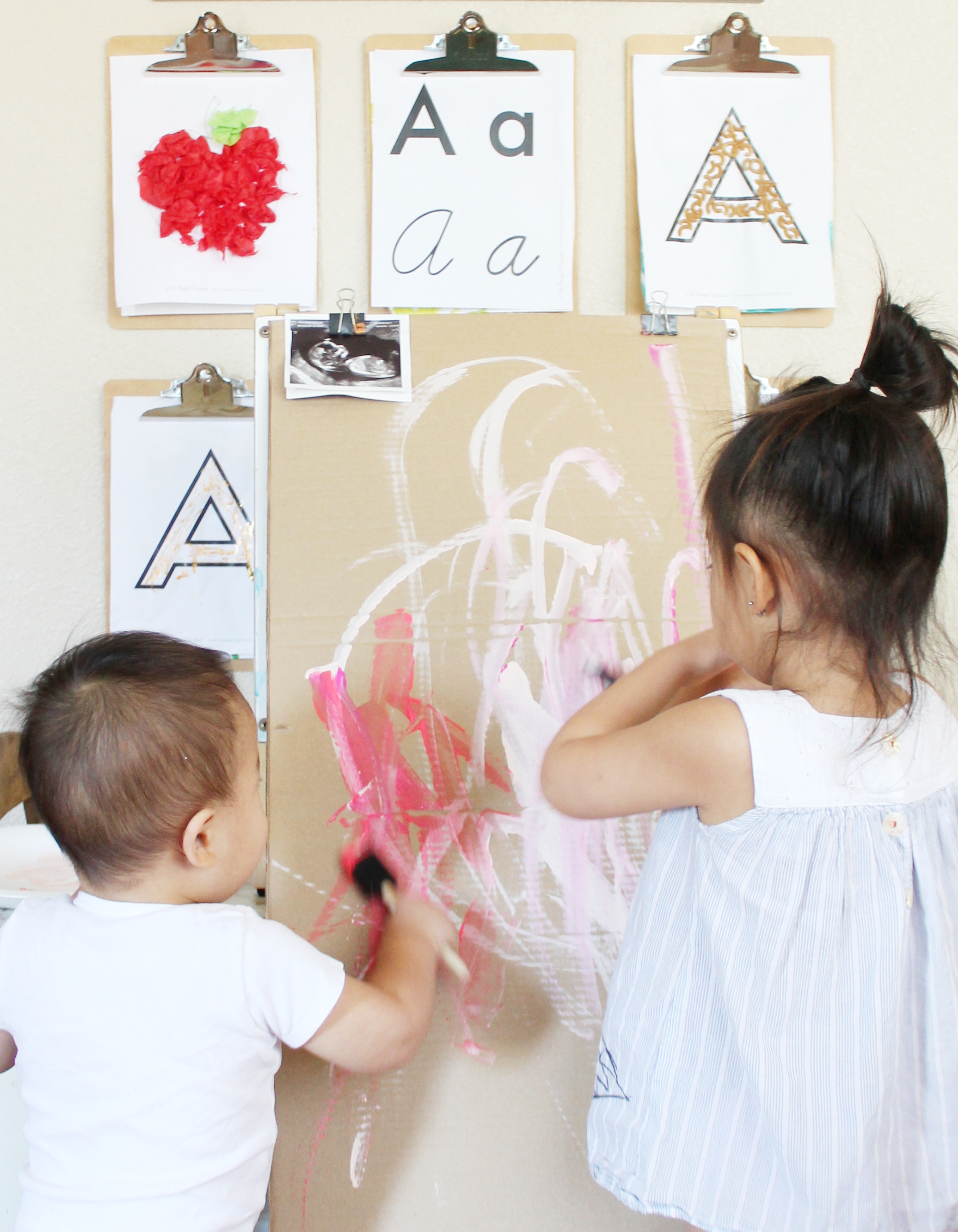 painting for their baby sister