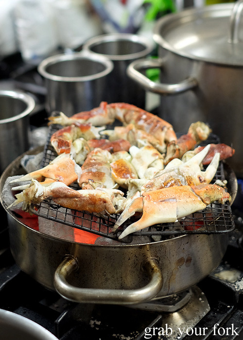 Crab cooking on charcoal by Nick Gannaway from The Bridge Room, Sydney at the Appetite for Excellence Young Chef of the Year 2016 final cook off