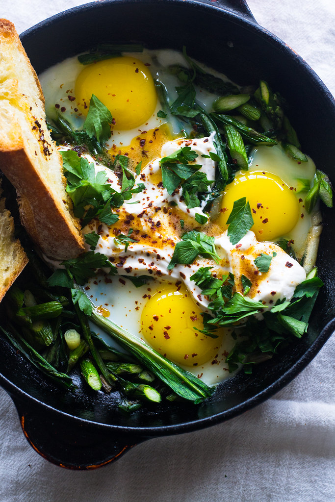 Spring Shakshuka with Ramps, Herbed Yogurt and Spiced Butter