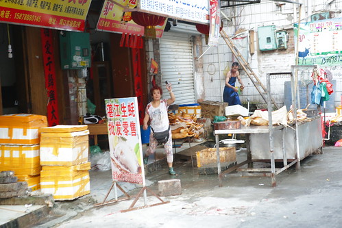 A dog meat seller at Yulin