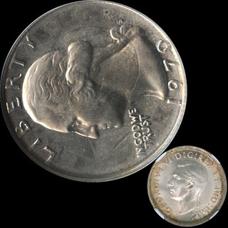 1970-s proof quarter struck on the back of a 1941 Canadian coin