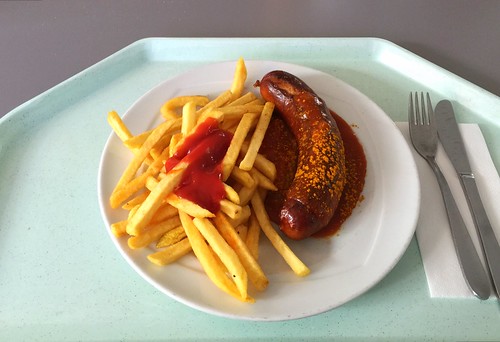Curried fried sausage with french fries /  Currywurst mit Pommes Frites