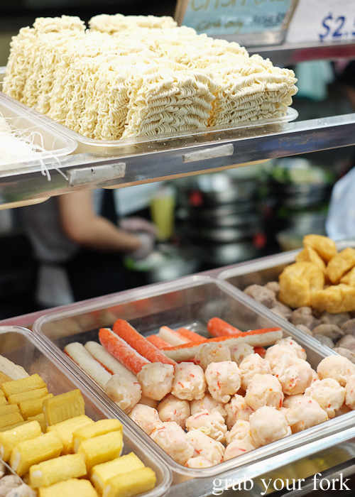 Instant noodles, seafood sticks and crab balls at Yang Guo Fu Ma La Tang, Haymarket