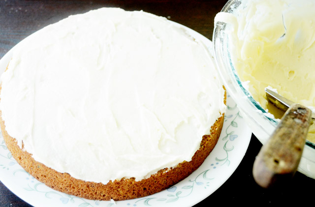 Frosting the carrot cake