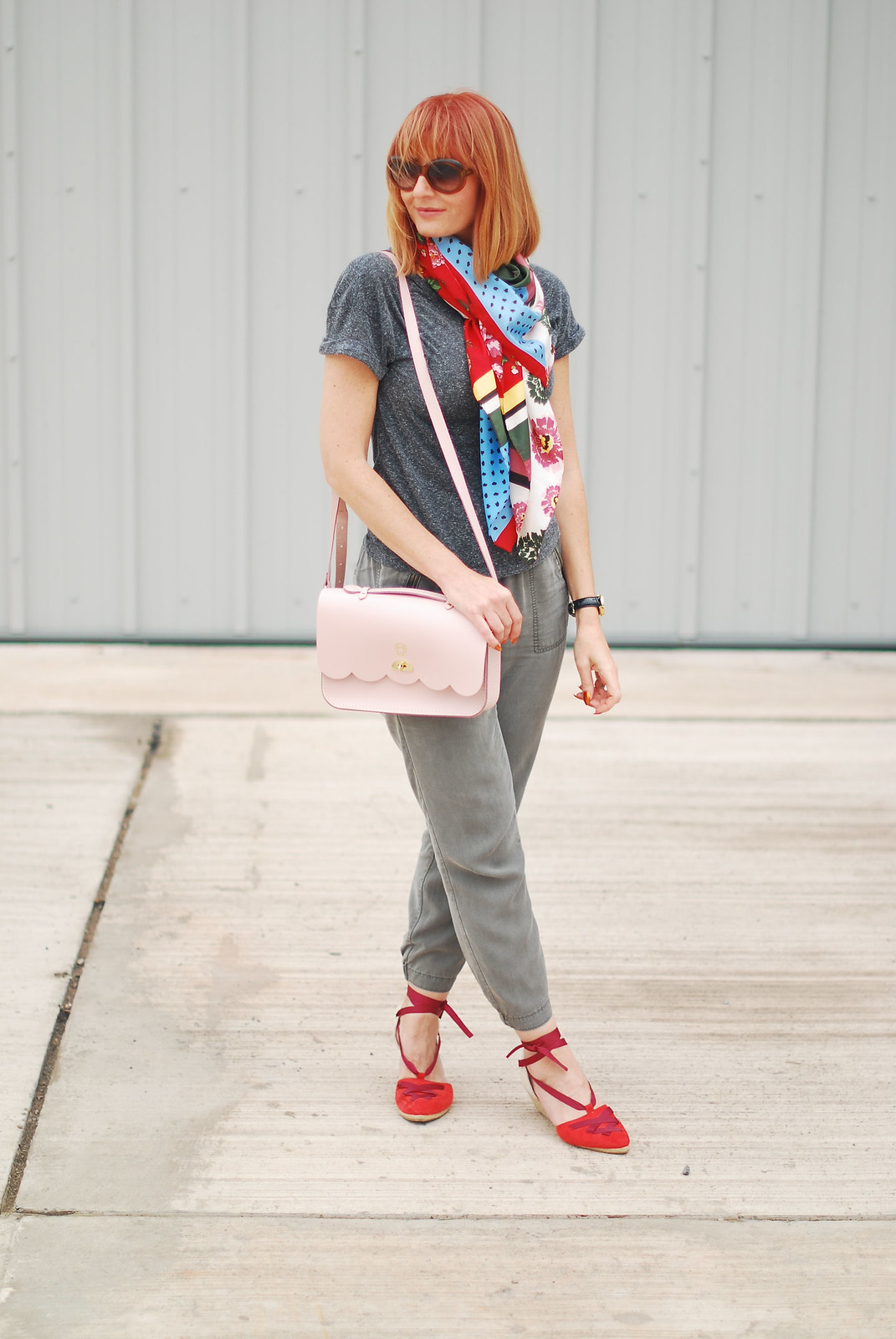 Simple grey and khaki outfit accessorised with brights: Multicoloured scarf, pink satchel bag, red lace-up espadrilles | Not Dressed As Lamb, over 40 style