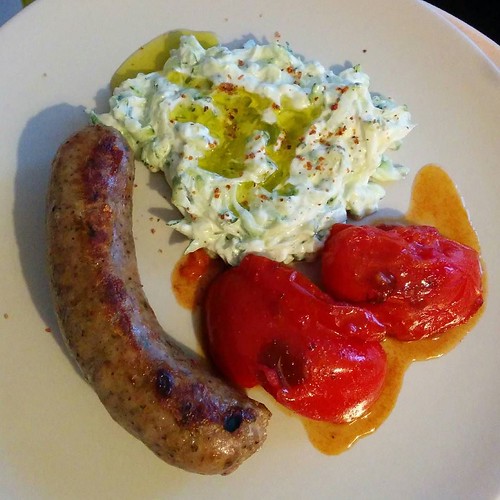 Fantastic Polish sausages with fried tomatoes and yogurt courgettes. Oh, those tomatoes were amazing.
