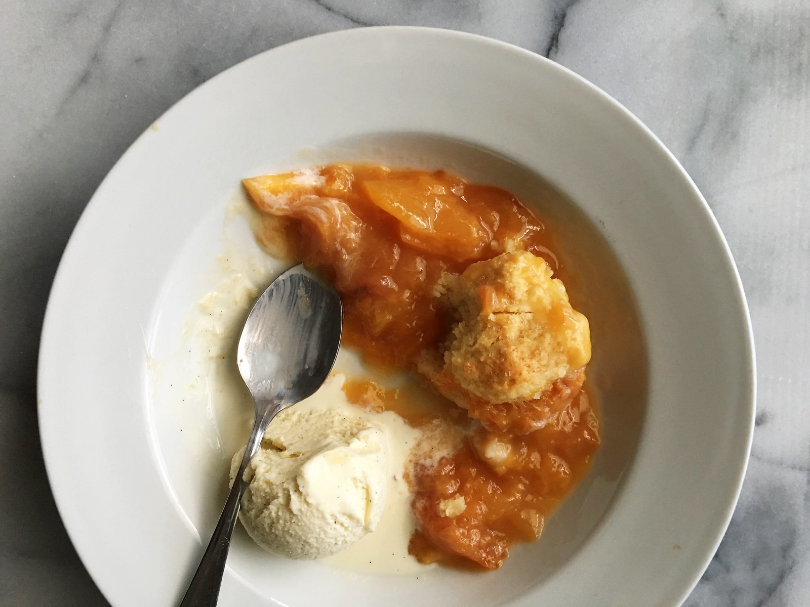 Old Fashioned Peach Cobbler from Kitchen in the Hills. This is a classic southern recipe that's simple to make and perfectly delicious!
