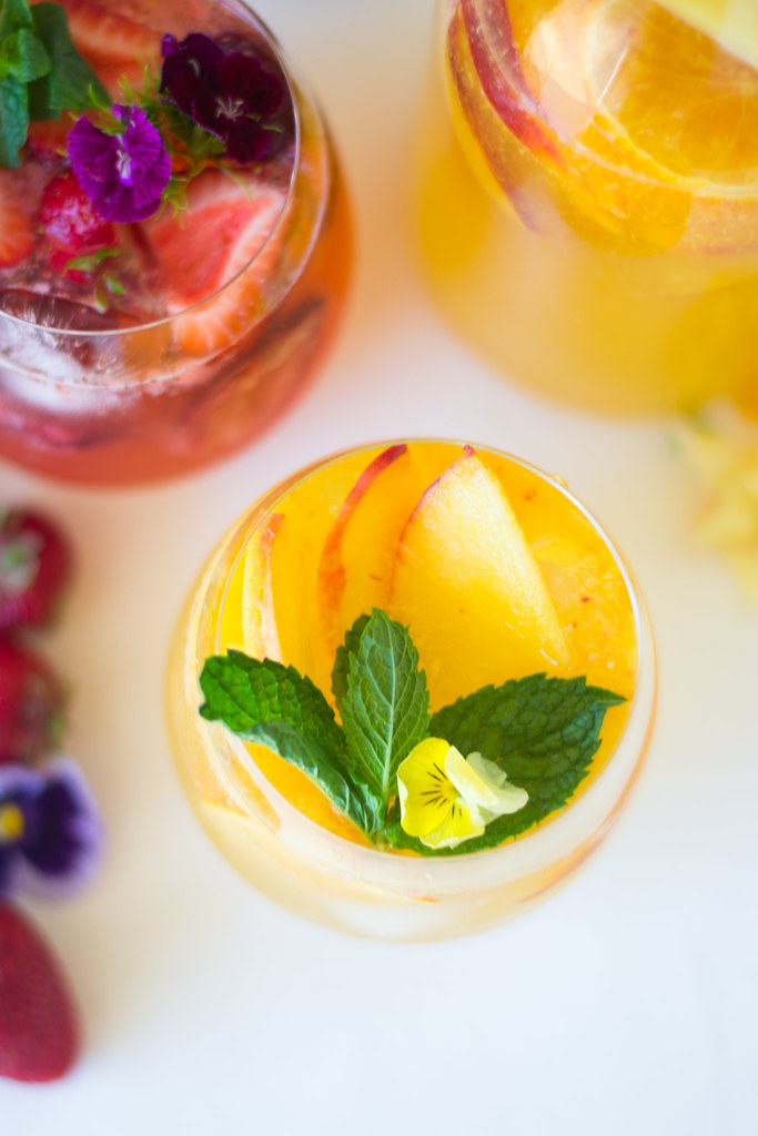 Strawberry Rose Sangria with rose water and Peach Orange sangria with orange blossom water.